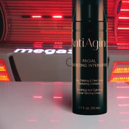 Onyx Anti-Ageing cream bottle standing in front of a MegaSun sunbed glowing with red light