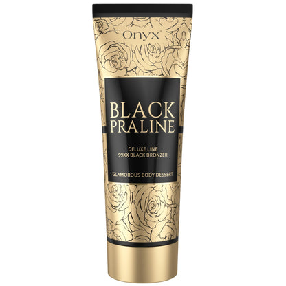 Product shot of Onyx Black Praline tanning cream in a golden floral tube on a light background, elegant and refined design