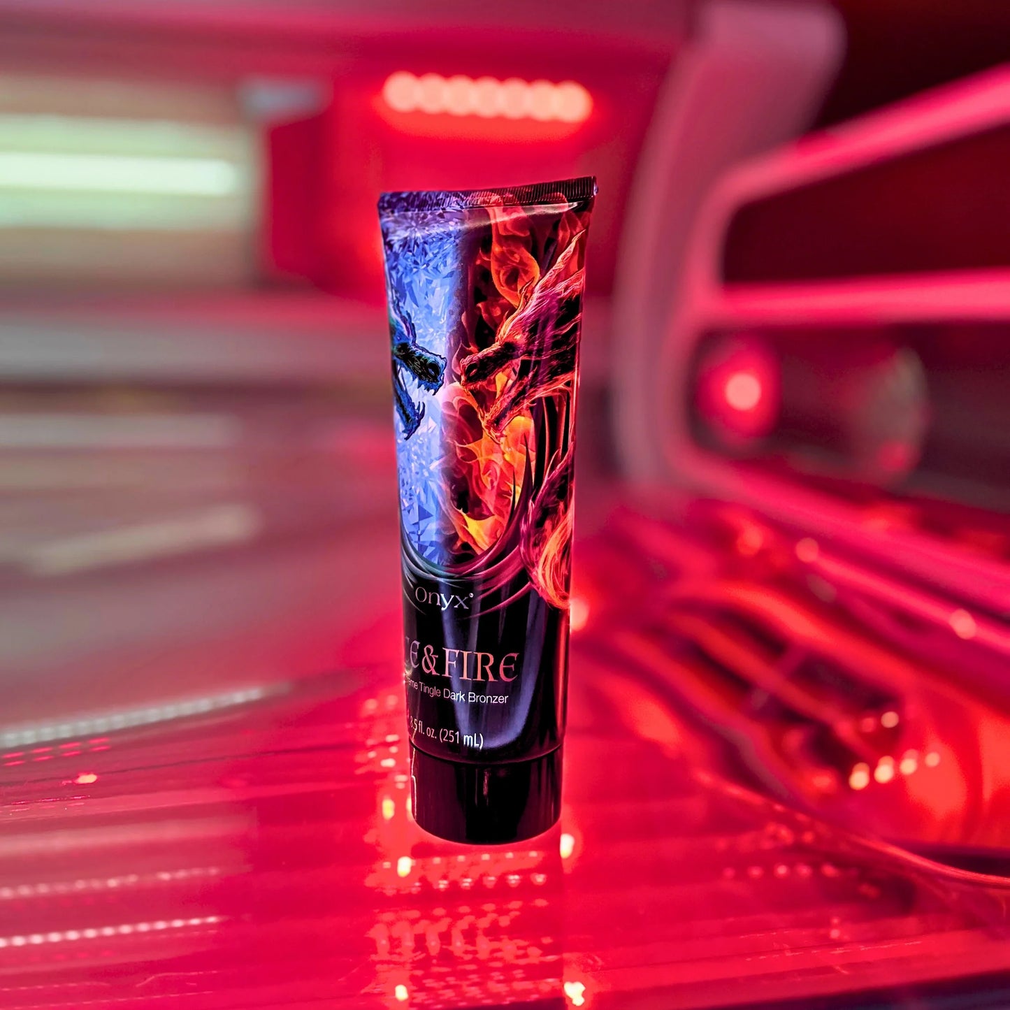 Onyx Ice & Fire tingle bronzer placed in a glowing red-lit sunbed, highlighting its heat-boosting power.