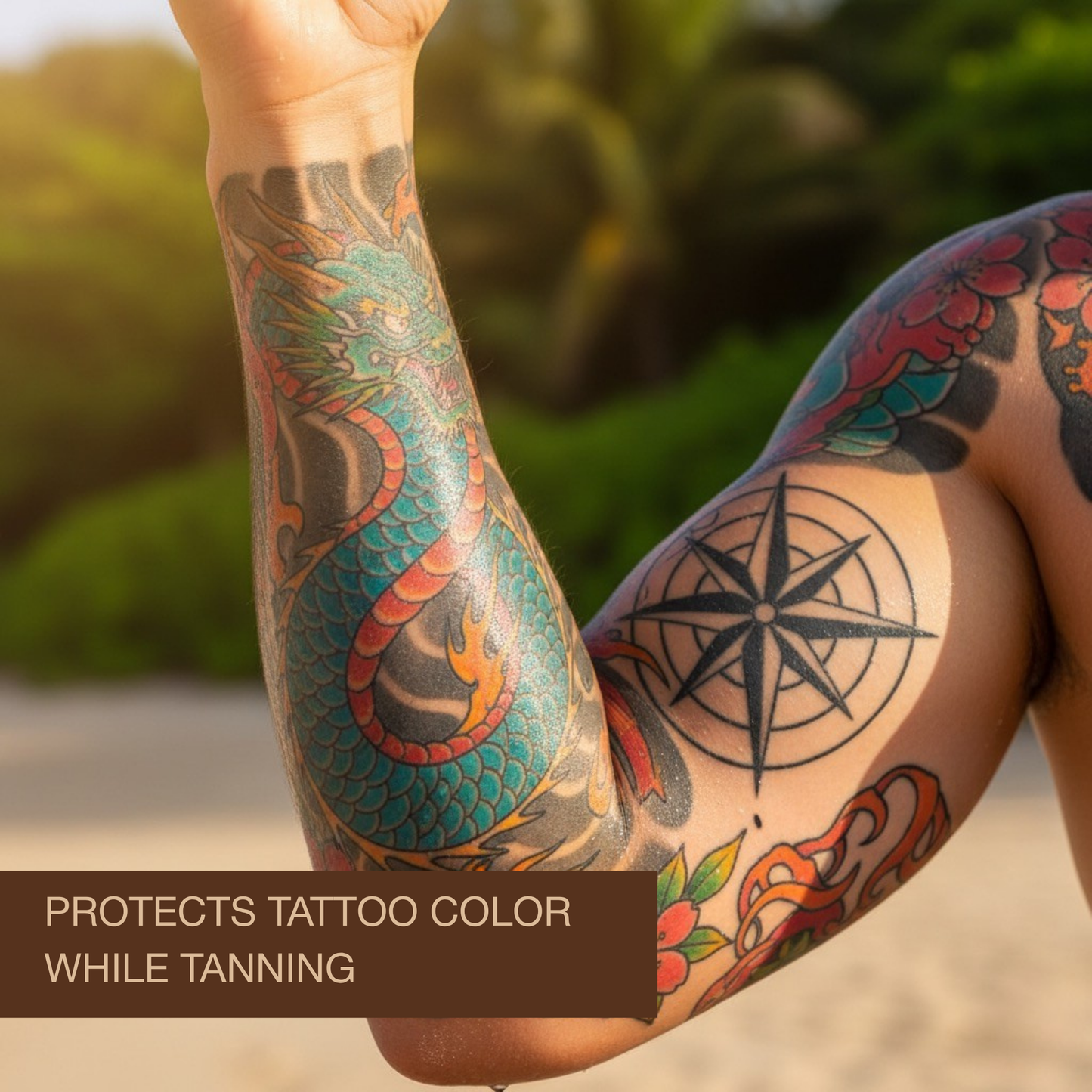 Bright tattoo sleeve on arm showing colour protection while tanning with Onyx Tattoo bronzing sunbed cream